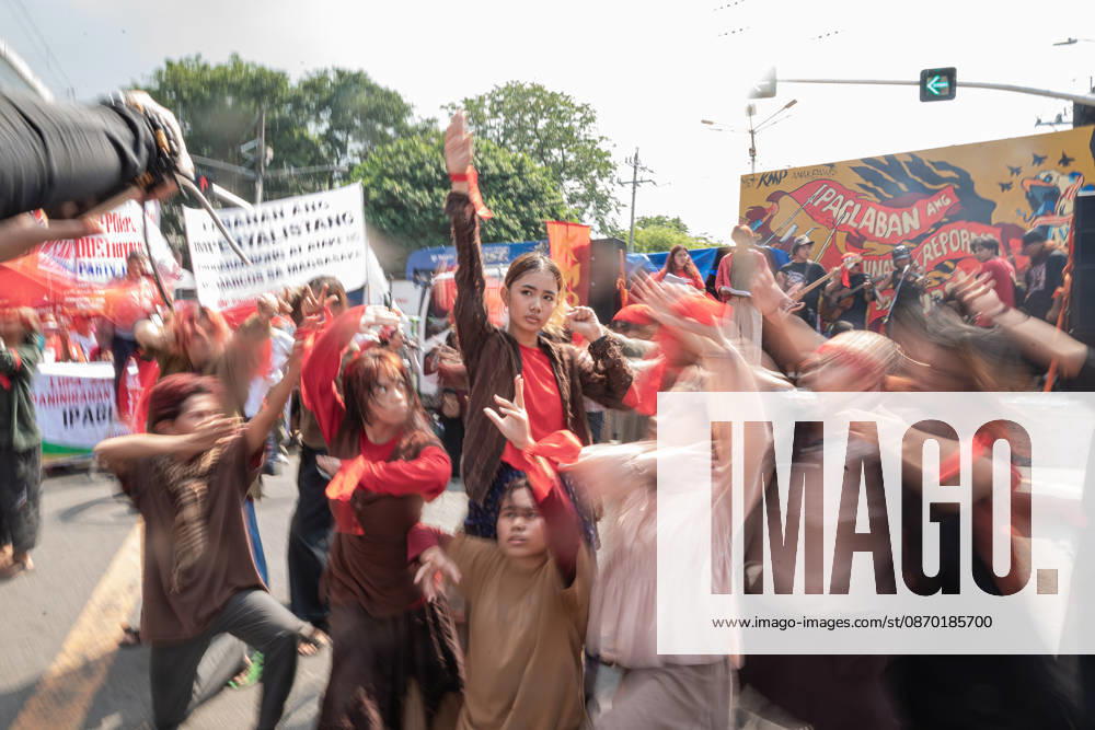 Hundreds of youth activists, rights advocates, and agrarian reform advocates marched with farmers, indigenous people, and workers as they celebrate Peasants Day. Quezon City Philippines - ZUMAy102 20261021_zip_y102_014