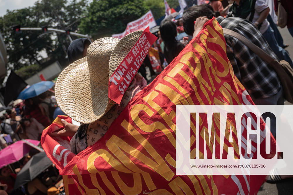 Hundreds of youth activists, rights advocates, and agrarian reform advocates marched with farmers, indigenous people, and workers as they celebrate Peasants Day. Quezon City Philippines - ZUMAy102 20261021_zip_y102_015