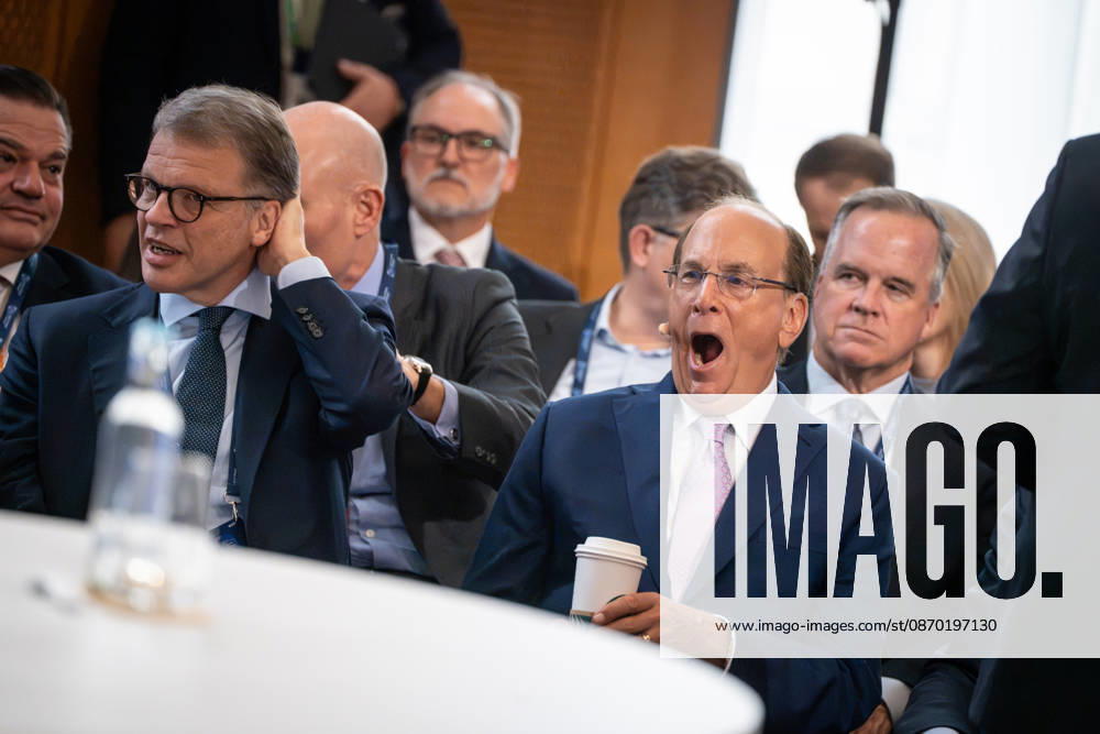 Larry Fink (Laurence Douglas Fink) with Starbucks Coffee’s Pappbecker in the front row at the Berlin Global Dialogue in the former State Council building of the GDR; seated to his left is Christian Sewing, CEO of Deutsche Bank AG. Berlin Global Dialogue 2026 (BGD 2026), theme: Advancing Alliances for a New Era, Berlin, Berlin, Germany, ESMT