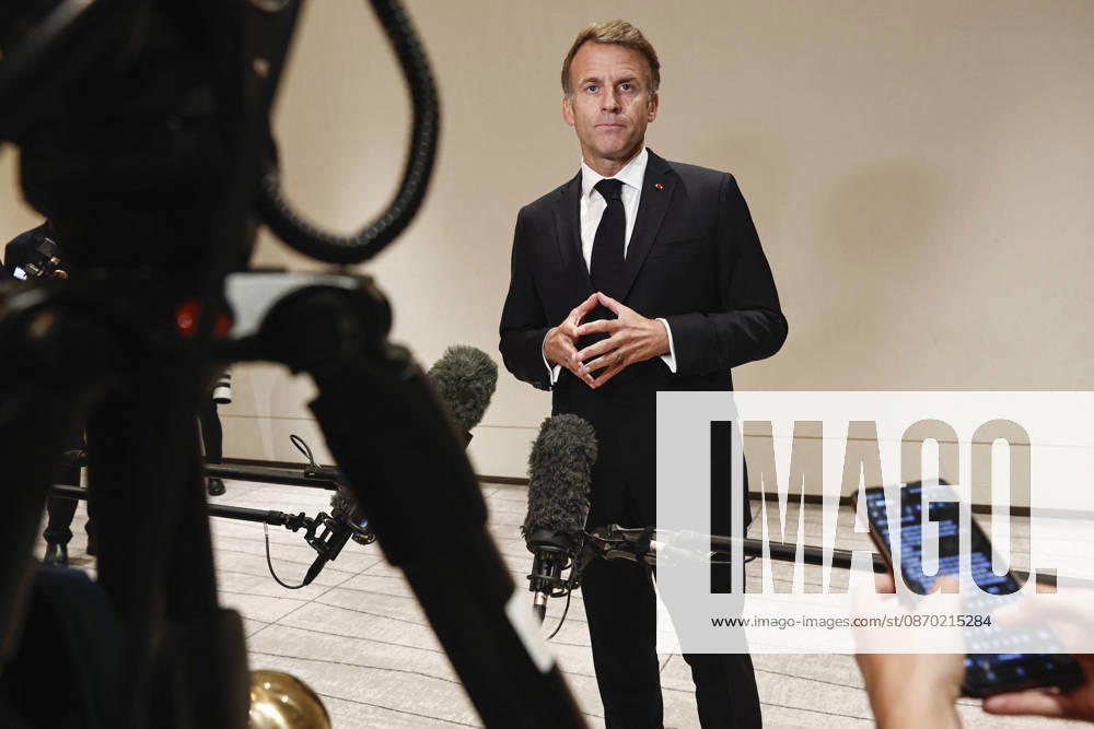 President Macron At The Opswf Summit During His Visit To Qatar French President Emmanuel Macron gestures as he speaks to members of the media on the day of the 9th Annual One Planet Sovereign Wealth Funds (OPSWF) Summit, in Lusail, Qatar, October 21, 2026. Photo by Benoit Tessier Pool ABACAPRESS.COM Lusail Qatar