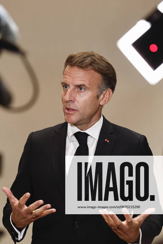 President Macron At The Opswf Summit During His Visit To Qatar French President Emmanuel Macron gestures as he speaks to members of the media on the day of the 9th Annual One Planet Sovereign Wealth Funds (OPSWF) Summit, in Lusail, Qatar, October 21, 2026. Photo by Benoit Tessier Pool ABACAPRESS.COM Lusail Qatar