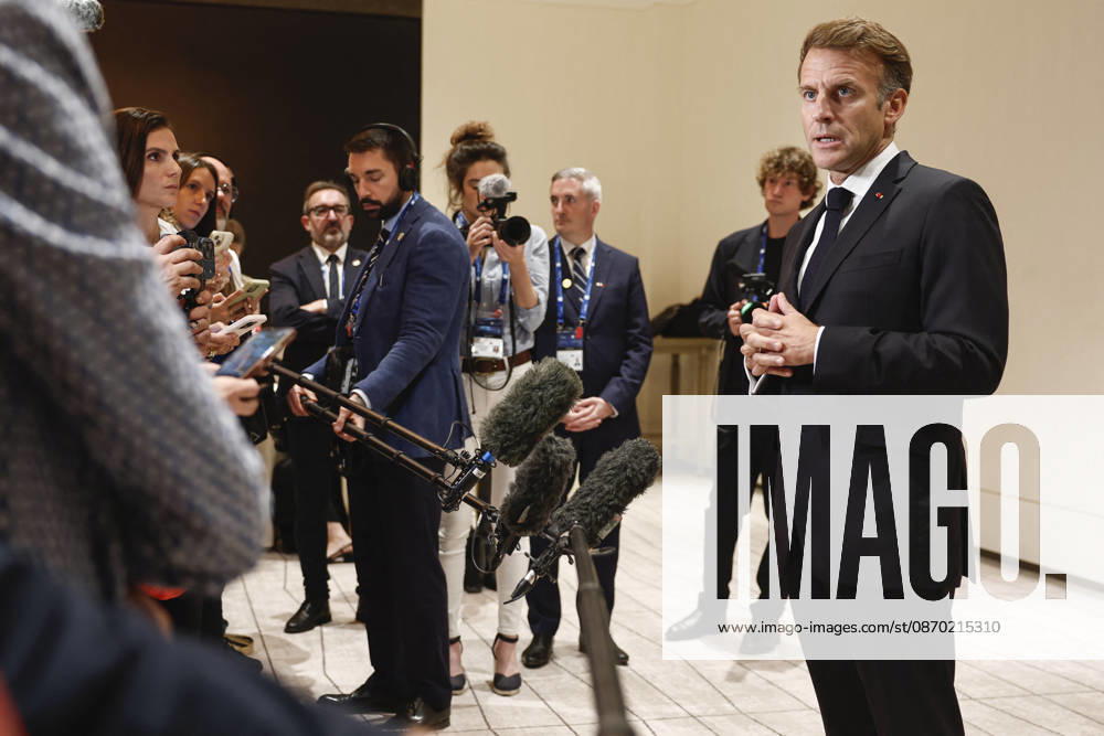 President Macron At The Opswf Summit During His Visit To Qatar French President Emmanuel Macron speaks to members of the media on the day of the 9th Annual One Planet Sovereign Wealth Funds (OPSWF) Summit, in Lusail, Qatar, October 21, 2026. Photo by Benoit Tessier Pool ABACAPRESS.COM Lusail Qatar