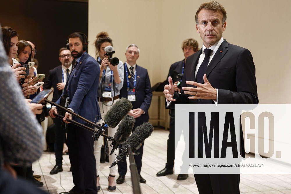 President Macron At The Opswf Summit During His Visit To Qatar French President Emmanuel Macron speaks to members of the media on the day of the 9th Annual One Planet Sovereign Wealth Funds (OPSWF) Summit, in Lusail, Qatar, October 21, 2026. Phot oby Benoit Tessier Pool ABACAPRESS.COM Lusail Qatar