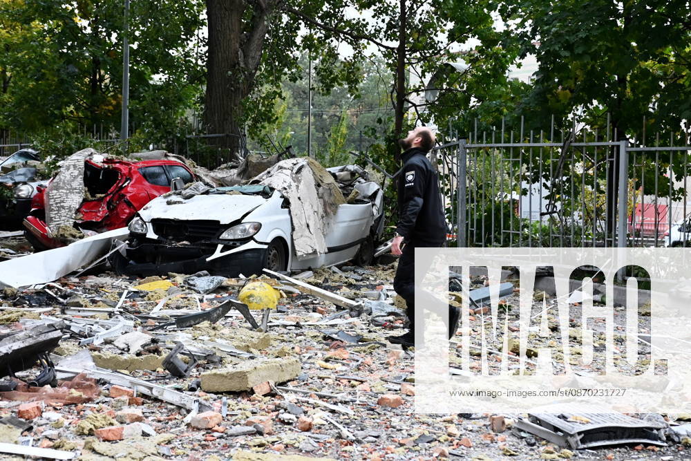 Aftermath Of A Russian Drone Strike In Kyiv Police officers walk on debris at the site of an apartment building damaged during a Russian drone strike in Kyiv, Ukraine, on October 21, 2026. Kyiv Ukraine