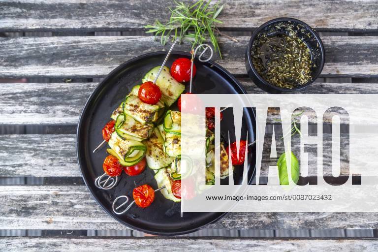 Grilled vegetarian grill skewers, tomato, sheep cheese and zucchini slices, rosemary garlic oil SARF03945