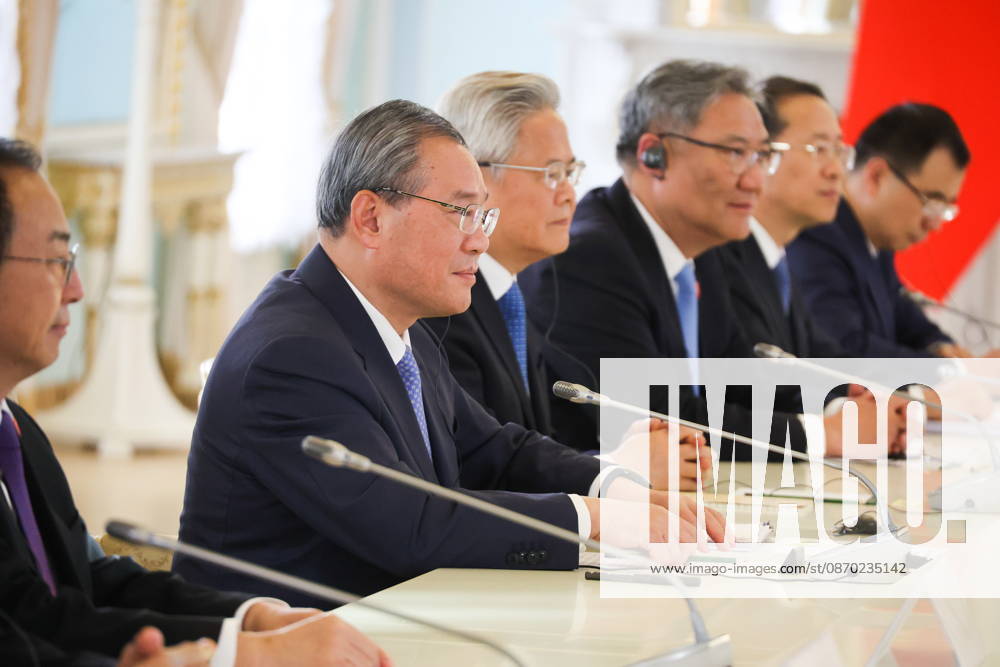 RUSSIA, ST PETERSBURG - OCTOBER 21, 2026: Chineese Premier Li Qiang (2nd L) is seen during a meeting with Russian President Vladimir Putin. Alexander Demianchuk TASS 99710443