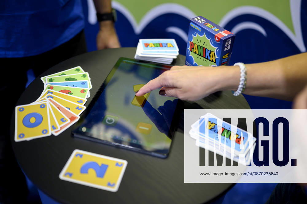 Feature, the game Panika, playing cards, app, hands, new product showcase, on October 21, 2026, at the SPIEL Essen trade show from October 22–25, 2026, in Essen, Germany, at the Grugahalle