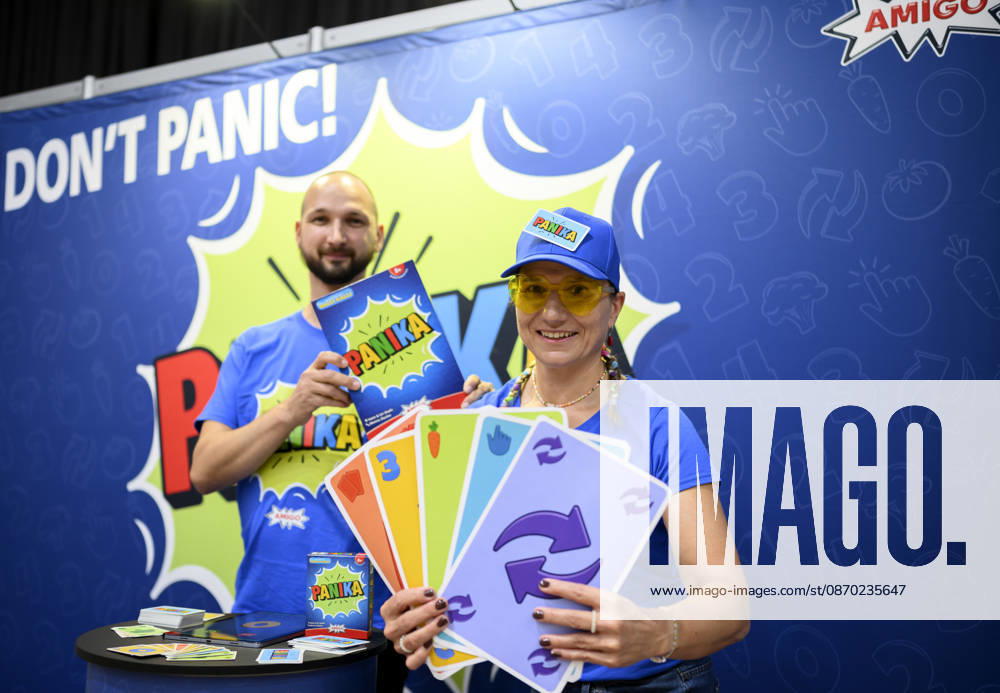 Score from the game Panika ; staff members present the game cards; new product showcase; on October 21, 2026, at the SPIEL Essen trade show, October 22–25, 2026, in Essen, Germany, at the Grugahalle