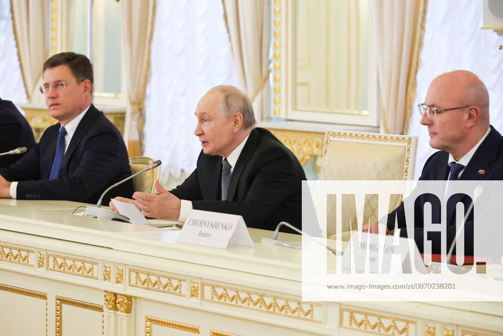 RUSSIA, ST PETERSBURG - OCTOBER 21, 2026: Russian Deputy Prime Minister Dmitry Chernyshenko, President Vladimir Putin Deputy Prime Minister Alexander Novak (L-R) are seen during a meeting with Chineese Premier Li Qiang St Petersburg Russia - ZUMAt113 20261021_zaa_t113_459