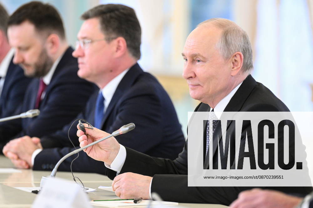 RUSSIA, ST PETERSBURG - OCTOBER 21, 2026: Russian President Vladimir Putin, Deputy Prime Minister Alexander Novak, and Deputy Chief of Staff Maxim Oreshkin (R-L) are seen during a meeting with Chineese Premier Li Qiang at the Constantine Palace. Kristina Solovyova POOL TASS 99710854