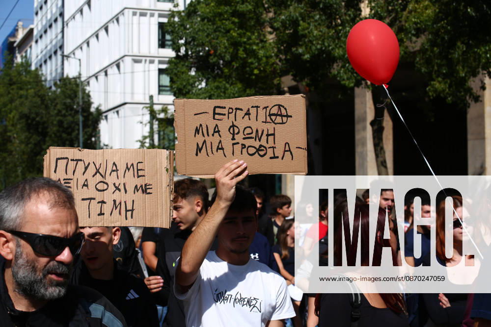 Students, school pupils, teachers and university professors take part in a large education protest. Thousands of demonstrators march through the city center, carrying banners and chanting slogans during the mass mobilization. Athens GREECE - ZUMAx103 20261021_zip_x103_028