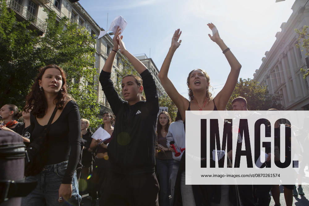Athens Greece Living Costs Protest Protesters raise their hands and chant slogans during a rally in Athens, Greece on October 21, 2026. Students and other demonstrators marched through central Athens to protest rising living costs and economic pressures. Organizers say the concerns raised by participants echo grievances voiced during recent demonstrations in France. Athens Attica Greece