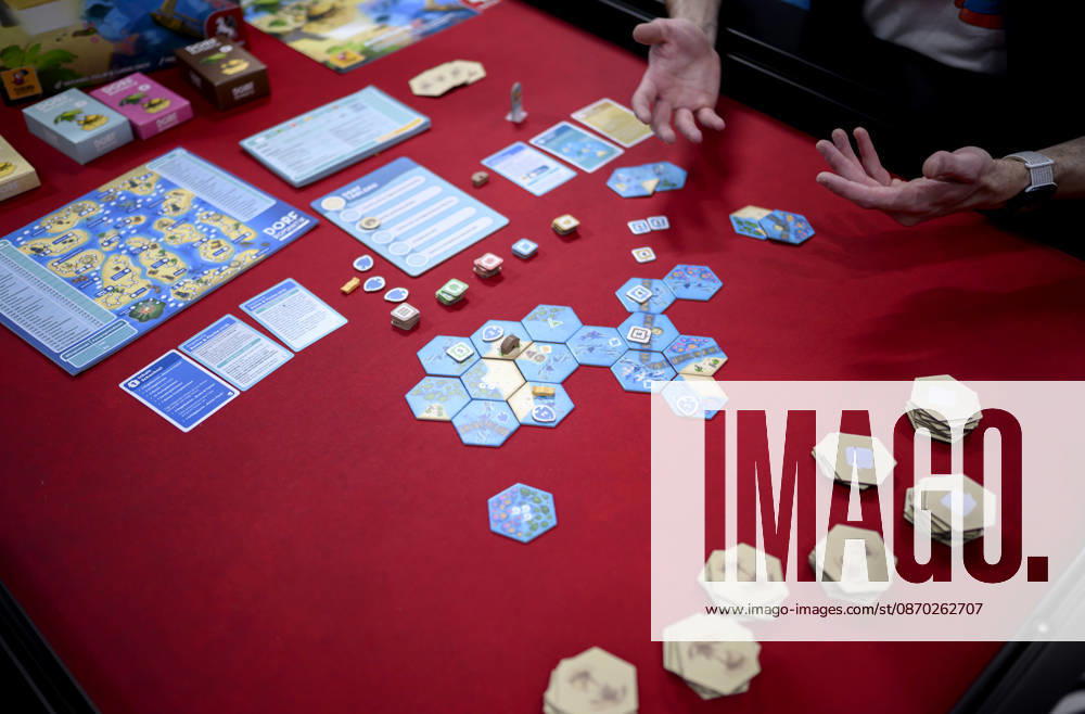 The game *Dorfromantik Südsee* by Pegasus Spiele; the tiles are laid out on the table, along with game pieces and other game components, New Product Showcase, October 21, 2026; SPIEL Essen trade fair from October 22–25, 2026, in Essen, Germany, Grugahalle
