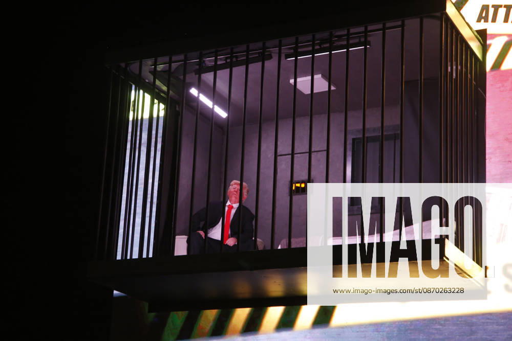 Actor impersonating Trump placed behind symbolic bars in Tehran TEHRAN, IRAN - OCTOBER 21: (RESTRICTIONS: No Access Israel Media Persian Language TV Stations Outside Iran Strictly No Access BBC Persian VOA Persian Manoto TV Iran International TV) An actor impersonating U.S. President Donald Trump stands behind symbolic prison bars set up inside an interactive billboard frame at Tajrish Square in Tehran, Iran. The installation drew significant attention from passersby and caused notable traffic congestion in the area as onlookers gathered to take photos. Fatemeh Bahrami Anadolu Tehran Iran. Editorial use only. Please get in touch for any other usage.