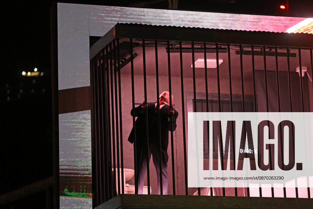 Actor impersonating Trump placed behind symbolic bars in Tehran TEHRAN, IRAN - OCTOBER 21: (RESTRICTIONS: No Access Israel Media Persian Language TV Stations Outside Iran Strictly No Access BBC Persian VOA Persian Manoto TV Iran International TV) An actor impersonating U.S. President Donald Trump stands behind symbolic prison bars set up inside an interactive billboard frame at Tajrish Square in Tehran, Iran. The installation drew significant attention from passersby and caused notable traffic congestion in the area as onlookers gathered to take photos. Fatemeh Bahrami Anadolu Tehran Iran. Editorial use only. Please get in touch for any other usage.