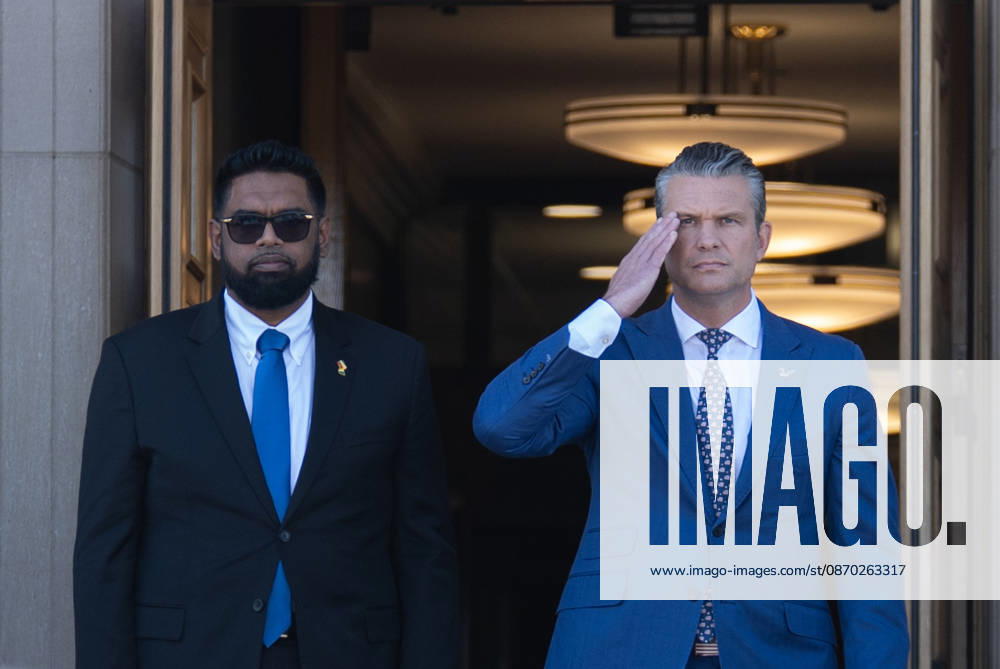 Secretary Hegseth hosts Guyanese President Mohamed Irfaan Ali at Pentagon ARLINGTON, VA, UNITED STATES - OCTOBER 21: U.S. Secretary of Defense Pete Hegseth (R) welcomes Guyanese President Mohamed Irfaan Ali (L) during an enhanced honor cordon at the Pentagon in Arlington, Virginia, on October 21, 2026. Mehmet Eser Anadolu Virginia United States. Editorial use only. Please get in touch for any other usage.
