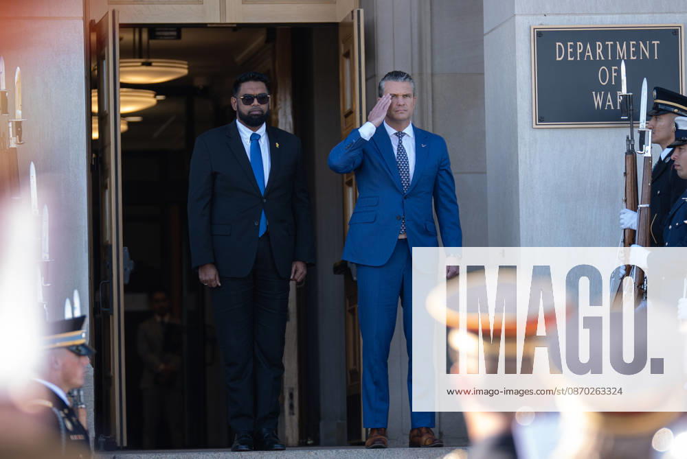 Secretary Hegseth hosts Guyanese President Mohamed Irfaan Ali at Pentagon ARLINGTON, VA, UNITED STATES - OCTOBER 21: U.S. Secretary of Defense Pete Hegseth (R) welcomes Guyanese President Mohamed Irfaan Ali (L) during an enhanced honor cordon at the Pentagon in Arlington, Virginia, on October 21, 2026. Mehmet Eser Anadolu Virginia United States. Editorial use only. Please get in touch for any other usage.