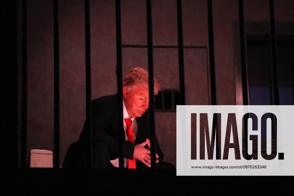 Actor impersonating Trump placed behind symbolic bars in Tehran TEHRAN, IRAN - OCTOBER 21: (RESTRICTIONS: No Access Israel Media Persian Language TV Stations Outside Iran Strictly No Access BBC Persian VOA Persian Manoto TV Iran International TV) An actor impersonating U.S. President Donald Trump stands behind symbolic prison bars set up inside an interactive billboard frame at Tajrish Square in Tehran, Iran. The installation drew significant attention from passersby and caused notable traffic congestion in the area as onlookers gathered to take photos. Fatemeh Bahrami Anadolu Tehran Iran. Editorial use only. Please get in touch for any other usage.