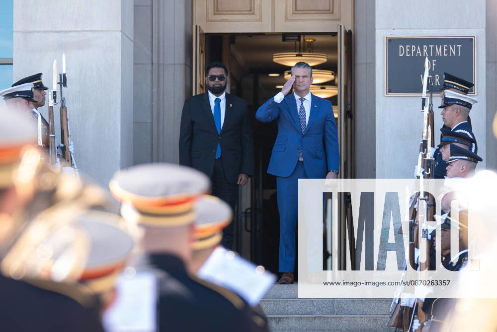 Secretary Hegseth hosts Guyanese President Mohamed Irfaan Ali at Pentagon ARLINGTON, VA, UNITED STATES - OCTOBER 21: U.S. Secretary of Defense Pete Hegseth (R) welcomes Guyanese President Mohamed Irfaan Ali (L) during an enhanced honor cordon at the Pentagon in Arlington, Virginia, on October 21, 2026. Mehmet Eser Anadolu Virginia United States. Editorial use only. Please get in touch for any other usage.
