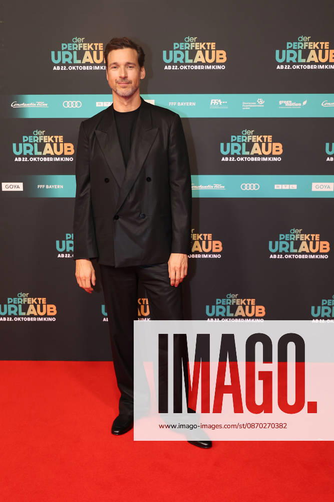 Florian David Fitz at the premiere of *Der perfekte Urlaub* at Cinedom on October 21, 2026, in Cologne, Germany. The premiere of *Der perfekte Urlaub* in Cologne, Germany