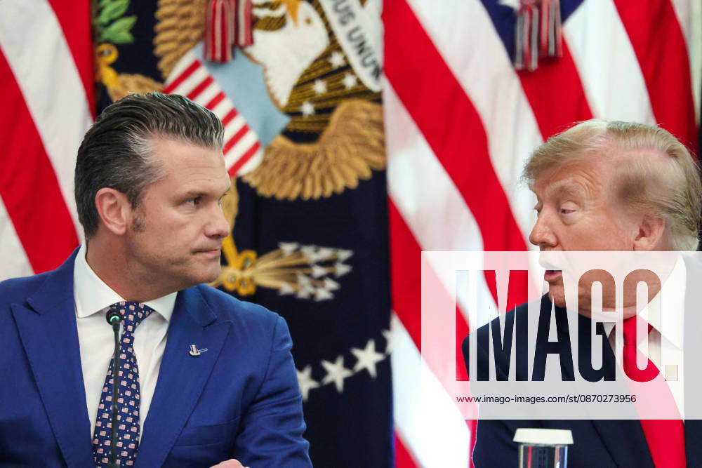 DC: President Trump Hosts Roundtable on Cybercrime at White House Pete Hegseth, Secretary of Defense, listens as President Donald Trump speaks during a roundtable discussion on cybercrime in the East Room of the White House on October 21, 2026 in Washington, D.C. The administration is fighting back against foreign-based organized criminal organizations that exploit Americans in cyberspace and their scam centers and fraud schemes. (Photo by Samuel Corum Pool ABACAPRESS.COM) Washington DC United States