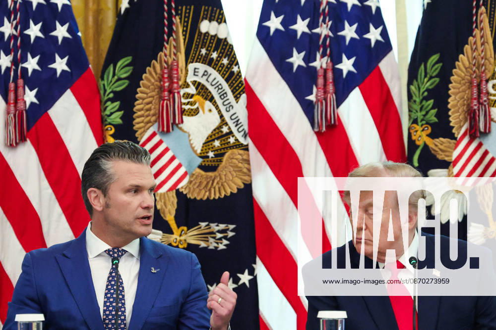DC: President Trump Hosts Roundtable on Cybercrime at White House Pete Hegseth, Secretary of Defense, speaks as President Donald Trump listens during a roundtable discussion on cybercrime in the East Room of the White House on October 21, 2026 in Washington, D.C. The administration is fighting back against foreign-based organized criminal organizations that exploit Americans in cyberspace and their scam centers and fraud schemes. (Photo by Samuel Corum Pool ABACAPRESS.COM) Washington DC United States