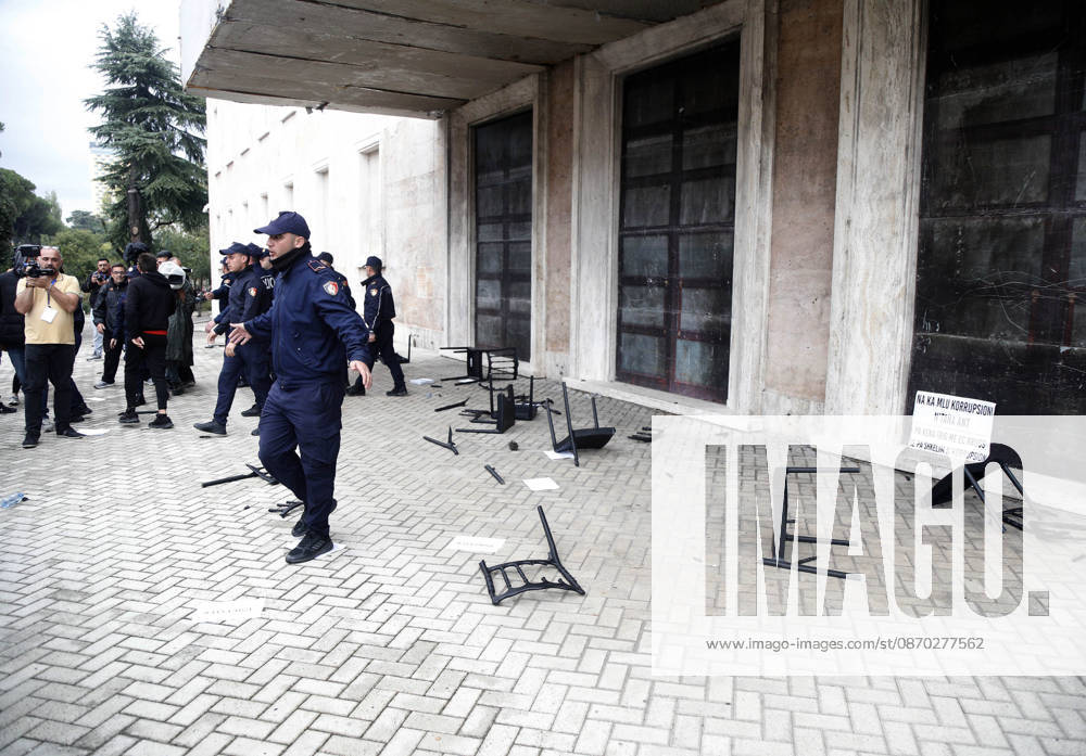 Protesters Clash with Police During a Demonstration in Tirana, Albania. Protesters destroy chairs set up by the PM s office for a proposed dialogue with students outside government headquarters in Tirana, Albania, on October 21, after several days of anti-government protests turned violent 2026. Albanian Prime Minister Edi Rama blamed a hybrid war for fuelling unrest in his country, after more than a week of violent anti-government demonstrations demanding better university conditions, anger over corruption and renewed calls for the Prime Minister s resignation. Light Studio Agency Malton Dibra Tirana Albania