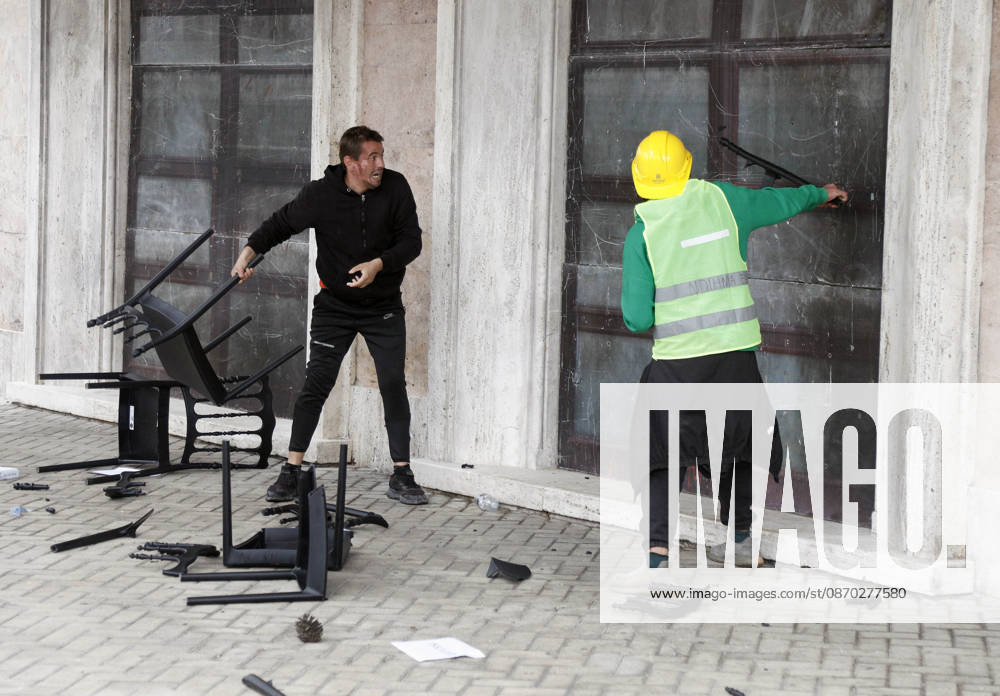 Protesters Clash with Police During a Demonstration in Tirana, Albania. Protesters destroy chairs set up by the PM s office for a proposed dialogue with students outside government headquarters in Tirana, Albania, on October 21, after several days of anti-government protests turned violent 2026. Albanian Prime Minister Edi Rama blamed a hybrid war for fuelling unrest in his country, after more than a week of violent anti-government demonstrations demanding better university conditions, anger over corruption and renewed calls for the Prime Minister s resignation. Light Studio Agency Malton Dibra Tirana Albania