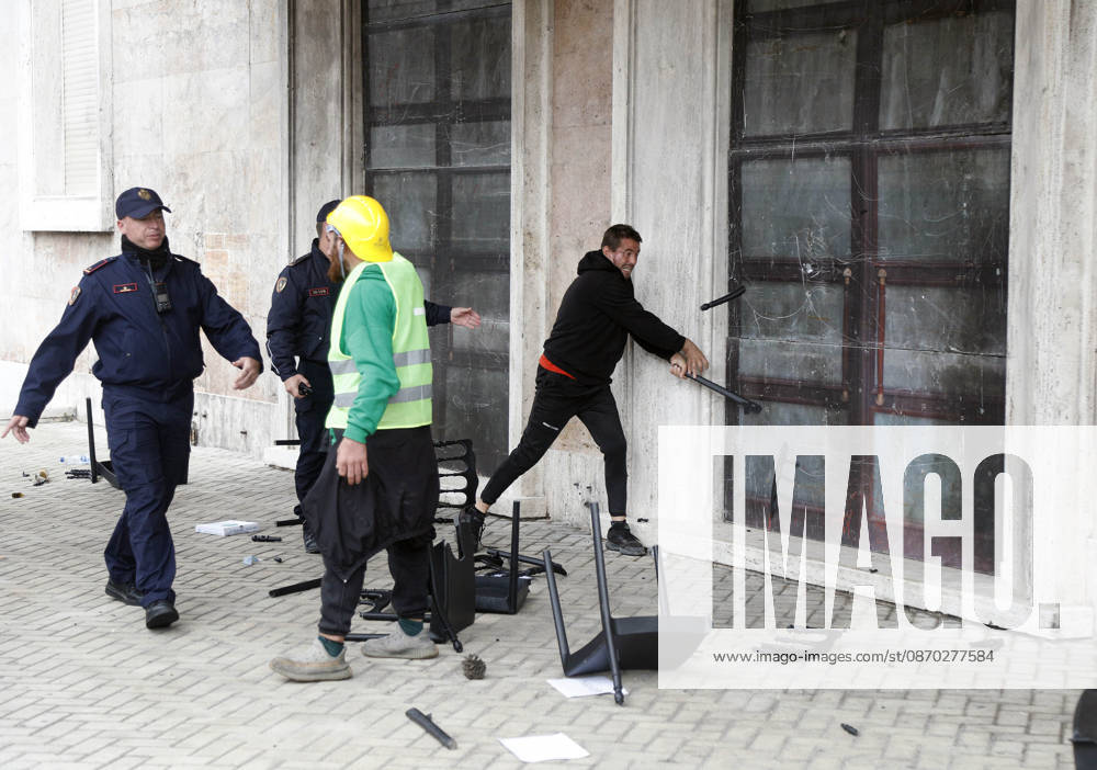 Protesters Clash with Police During a Demonstration in Tirana, Albania. Protesters destroy chairs set up by the PM s office for a proposed dialogue with students outside government headquarters in Tirana, Albania, on October 21, after several days of anti-government protests turned violent 2026. Albanian Prime Minister Edi Rama blamed a hybrid war for fuelling unrest in his country, after more than a week of violent anti-government demonstrations demanding better university conditions, anger over corruption and renewed calls for the Prime Minister s resignation. Light Studio Agency Malton Dibra Tirana Albania