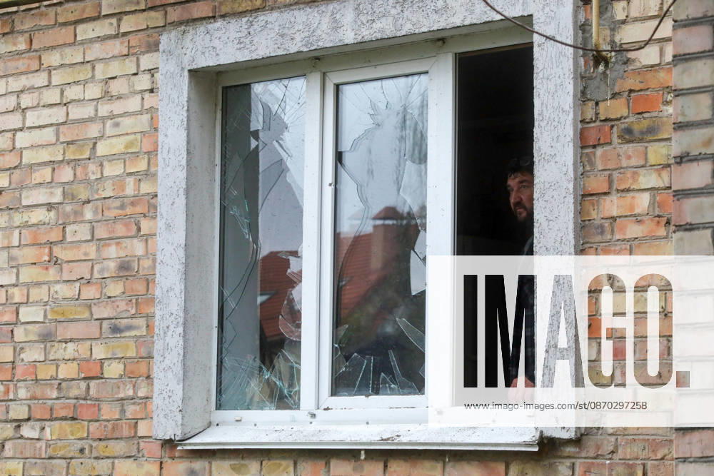 A man stands at a shattered window in an apartment block damaged by a Russian drone attack, Petropavlivska Borshchahivka, Kyiv region, Ukraine, October 21, 2026. (Photo by Volodymyr Tarasov Ukrinform) Consequences of Russian drone attack in Kyiv region