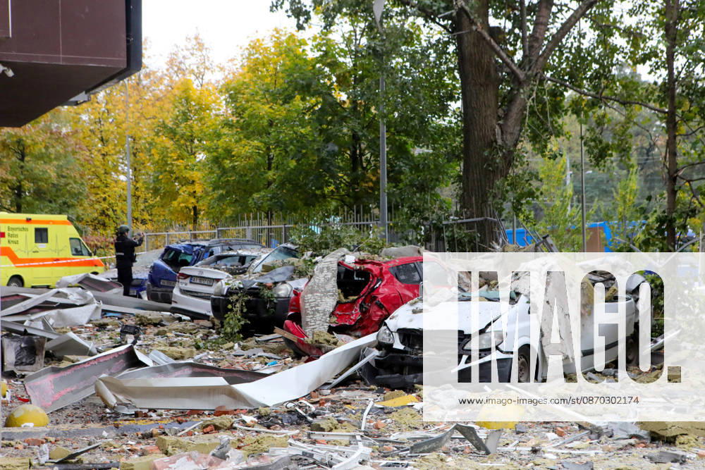 Rubble carpets the ground at a parking lot where cars were destroyed by a Russian drone strike on an apartment block in the Sviatoshynskyi district, Kyiv, Ukraine, October 21, 2026. The drone hit the building’s 20th floor, sparking a fire. Two people were killed in the attack. (Photo by Volodymyr Tarasov Ukrinform) Russian drone hits 24-storey apartment block in Kyiv