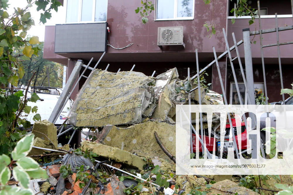 Pieces of mineral wool hang on the fence outside an apartment block in the Sviatoshynskyi district damaged by a Russian drone strike, Kyiv, Ukraine, October 21, 2026. The drone hit the building’s 20th floor, sparking a fire. Two people were killed in the attack. (Photo by Volodymyr Tarasov Ukrinform) Russian drone hits 24-storey apartment block in Kyiv