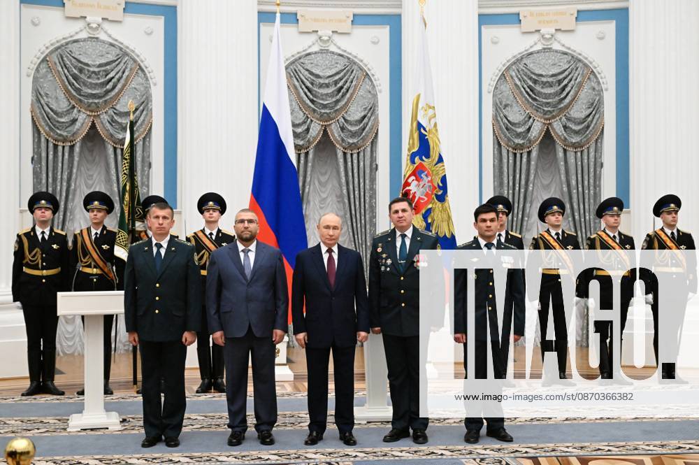 Russia Putin Federal Customs Service 9270466 22.10.2026 Russian President Vladimir Putin and Federal Customs Service head Valery Pikalev, 2nd left, attend a ceremony to present the agency with its banner at the Kremlin in Moscow, Russia. Pelagiya Tikhonova Sputnik Moscow Russia