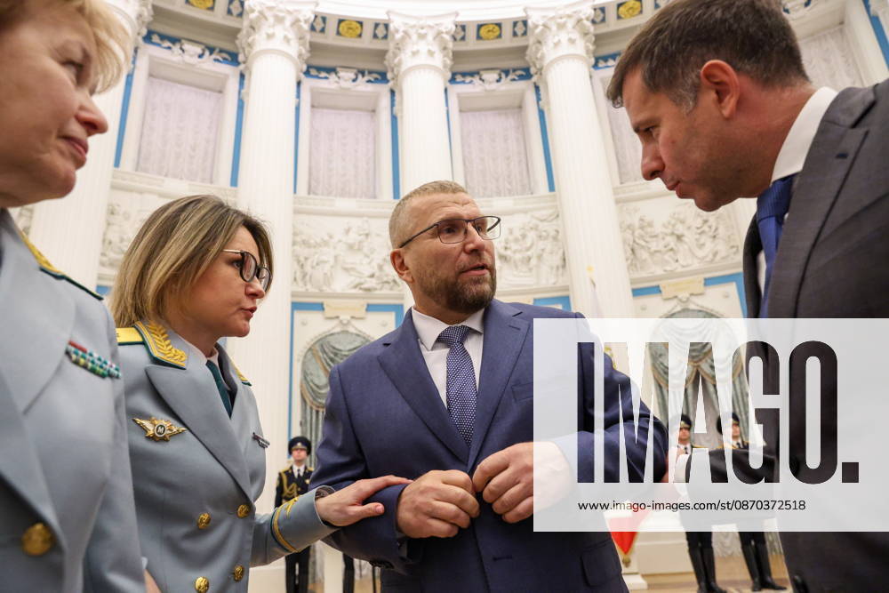 RUSSIA, MOSCOW - OCTOBER 22, 2026: The head of the Federal Customs Service of Russia, Valery Pikalev, (C) is seen during a ceremony at the Kremlin in which he was presented the agency s banner by Russia s President Putin (not pictured). Approved by a presidential decree in 2019, the banner has not yet been presented to the agency s top official Moscow Russia - ZUMAt113 20261022_zaa_t113_379