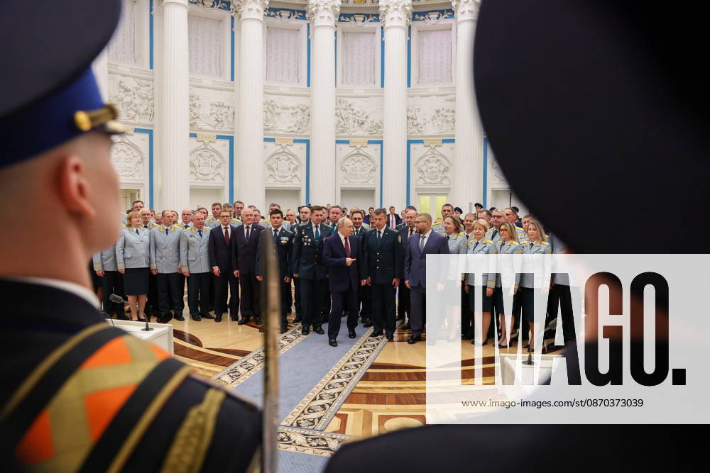 RUSSIA, MOSCOW - OCTOBER 22, 2026: Russia s President Vladimir Putin (C midground), the Federal Customs Service of Russia to the agency s head Valery Pikalev (5th R midground) and senior customs officers are seen during a ceremony at the Kremlin in which Pikalev was presented the agency s banner. Approved by a presidential decree in 2019, the banner has not yet been presented to the agency s top official Moscow Russia - ZUMAt113 20261022_zaa_t113_407