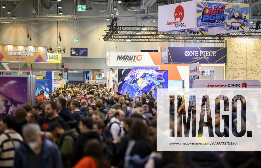 Visitors in the exhibition halls, Hall 5: Trading Card Games, One Piece, Naruto, Sushi Push, on October 22, 2026, at the SPIEL Essen trade show from October 22–25, 2026, in Essen, Germany, at the Grugahalle