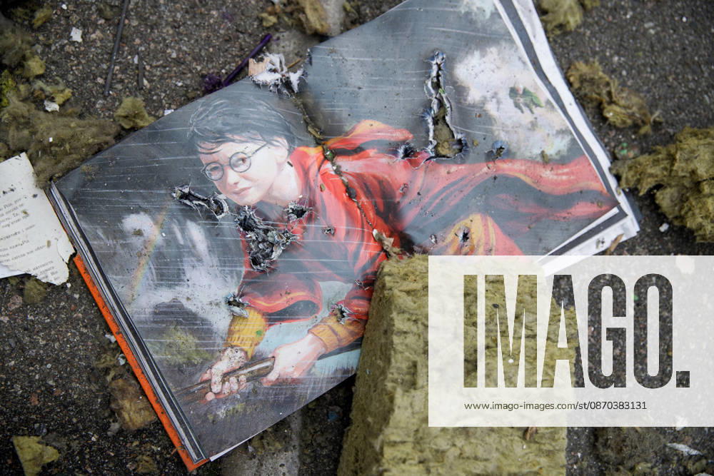 A book from the Harry Potter series by British author J. K. Rowling lies on the ground among rubble in a shopping area in the Obolonskyi district damaged by a Russian attack, Kyiv, Ukraine, October 22, 2026. On Thursday night, Russian forces struck the Ukrainian capital with ballistic missiles and drones. According to the Kyiv City Military Administration, six districts came under attack. One person was killed, 24 were injured, and 16 of them were hospitalised. (Photo by Marianna Kotyk Ukrinform) Russian attack destroys shops in Kyiv