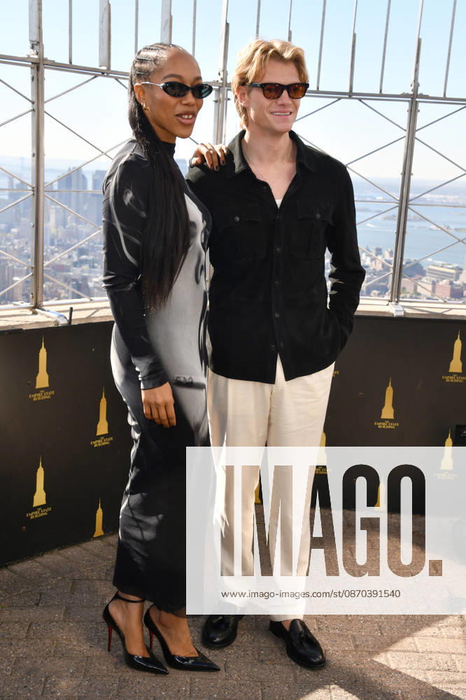 NEW YORK, NY- OCTOBER 22: Naomi Ackie and Tom Rhys Harries at the Empire State Building promoting the release of DC Studios Clayface on October 22, 2026 in New York City.