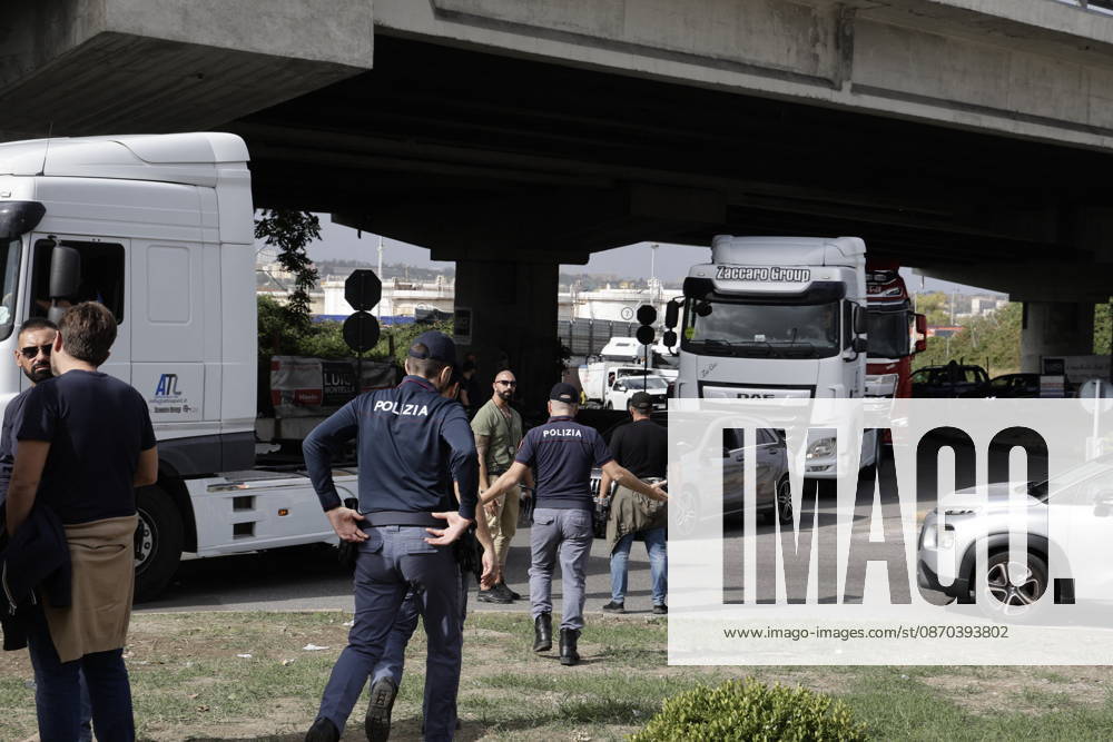 Truck Drivers Strike - Naples Truck drivers and supporters block one lane of Via Nuova Marina in Naples, Italy on October 22, 2026, during a strike against rising fuel costs that has disrupted port access at the Bausan entrance. Photo by Napolipress IPA ABACAPRESS.COM Naples Italy