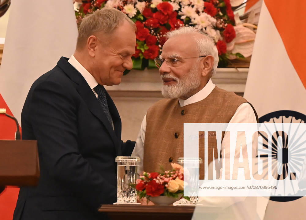 Prime Minister Narendra Modi (R) speaks with Prime Minister of Poland Donald Tusk (L) during a joint press statement following delegation-level bilateral talks at Hyderabad House on October 22, 2026 in New Delhi, India. The high-level meeting marked Polish Prime Minister Tusk s official visit to India from October 21-23, 2026 his first visit to the country as Prime Minister since 2010 aimed at advancing the India-Poland Strategic Partnership and deepening India-EU strategic ties. During wide-ranging discussions, both leaders reviewed bilateral cooperation across key sectors including trade, technology, defense-industrial collaboration, and energy, while reaffirming joint commitment toward peaceful diplomatic s