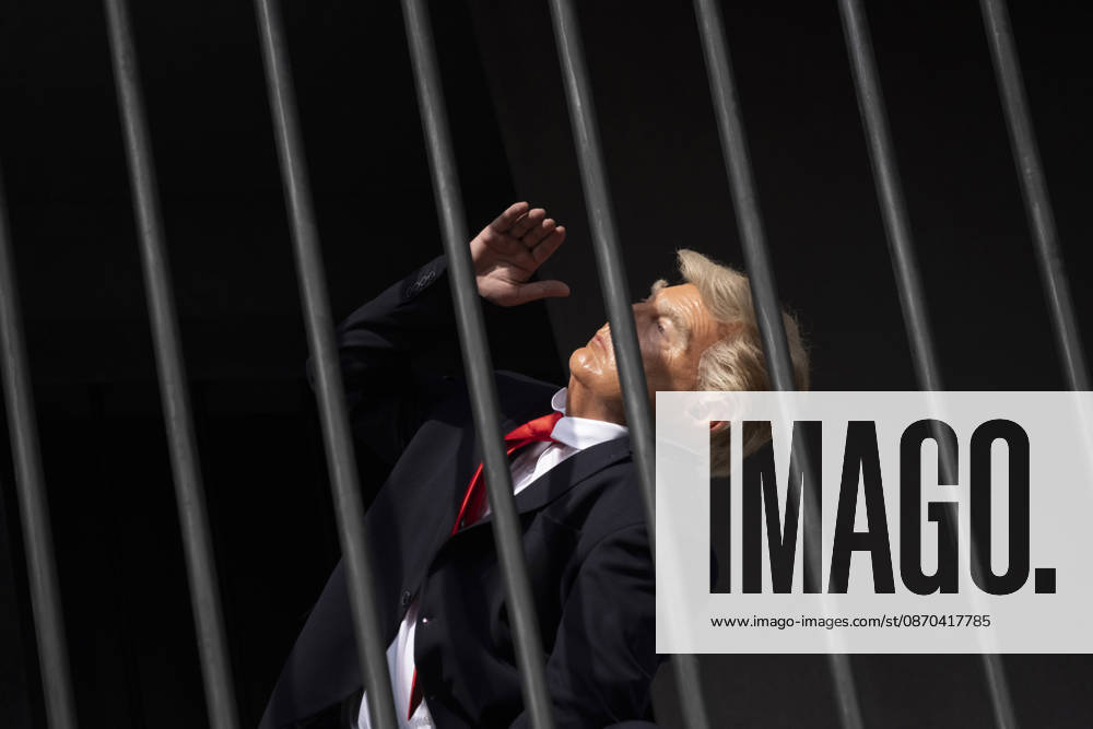 Anti-U.S. President Trump Performance On Billboard Reactions An Iranian masked man performs as U.S. President Donald Trump inside a symbolic cell mounted on a billboard in northern Tehran, Iran, on October 22, 2026, amid escalating tensions between Iran and the United States. Tehran Tehran Iran