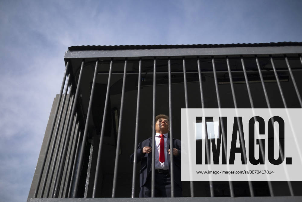 Anti-U.S. President Trump Performance On Billboard Reactions An Iranian masked man performs as U.S. President Donald Trump inside a symbolic cell mounted on a billboard in northern Tehran, Iran, on October 22, 2026, amid escalating tensions between Iran and the United States. Tehran Tehran Iran
