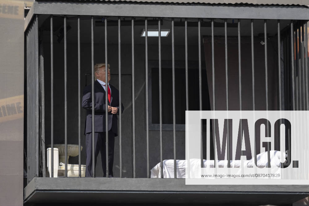 Anti-U.S. President Trump Performance On Billboard Reactions An Iranian masked man performs as U.S. President Donald Trump inside a symbolic cell mounted on a billboard in northern Tehran, Iran, on October 22, 2026, amid escalating tensions between Iran and the United States. Tehran Tehran Iran