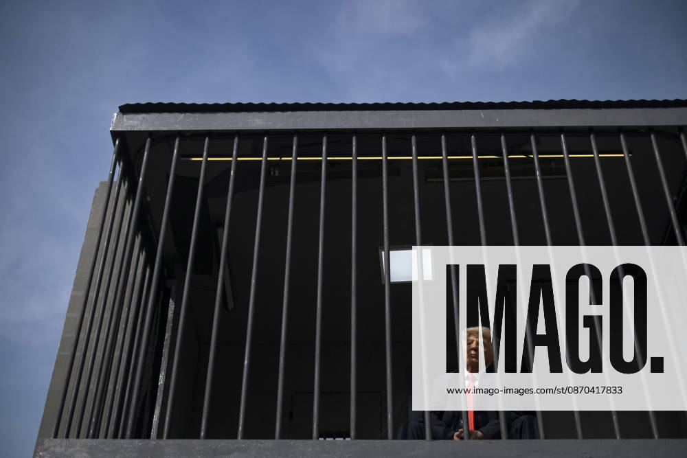 Anti-U.S. President Trump Performance On Billboard Reactions An Iranian masked man performs as U.S. President Donald Trump inside a symbolic cell mounted on a billboard in northern Tehran, Iran, on October 22, 2026, amid escalating tensions between Iran and the United States. Tehran Tehran Iran