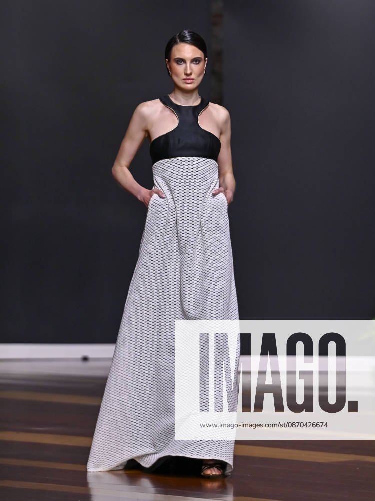 A model walks the runway during the RAFAEL URQUIZAR fashion show, as part of Atelier Couture, held at the Fabrica de Tapices, on october 20, 2026, in Madrid, Spain. Madrid Spain - ZUMAc312 20261022_zsp_c312_024
