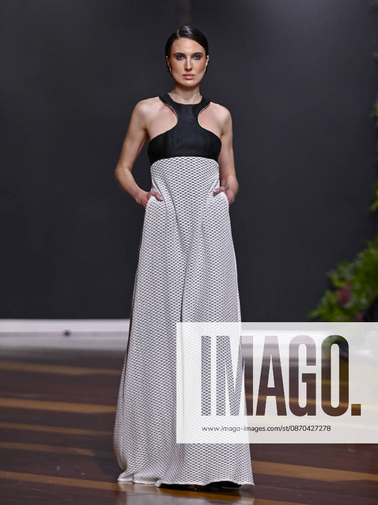A model walks the runway during the RAFAEL URQUIZAR fashion show, as part of Atelier Couture, held at the Fabrica de Tapices, on october 20, 2026, in Madrid, Spain. Madrid Spain - ZUMAc312 20261022_zsp_c312_034
