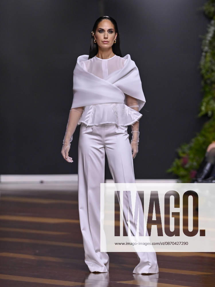 A model walks the runway during the RAFAEL URQUIZAR fashion show, as part of Atelier Couture, held at the Fabrica de Tapices, on october 20, 2026, in Madrid, Spain. Madrid Spain - ZUMAc312 20261022_zsp_c312_044
