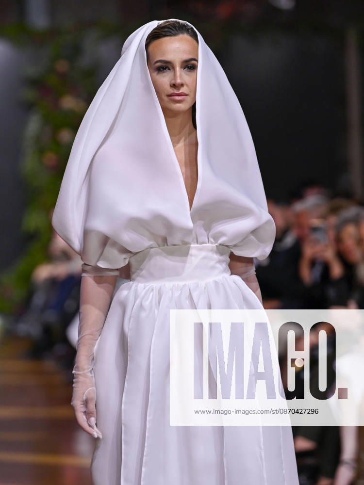 A model walks the runway during the RAFAEL URQUIZAR fashion show, as part of Atelier Couture, held at the Fabrica de Tapices, on october 20, 2026, in Madrid, Spain. Madrid Spain - ZUMAc312 20261022_zsp_c312_049