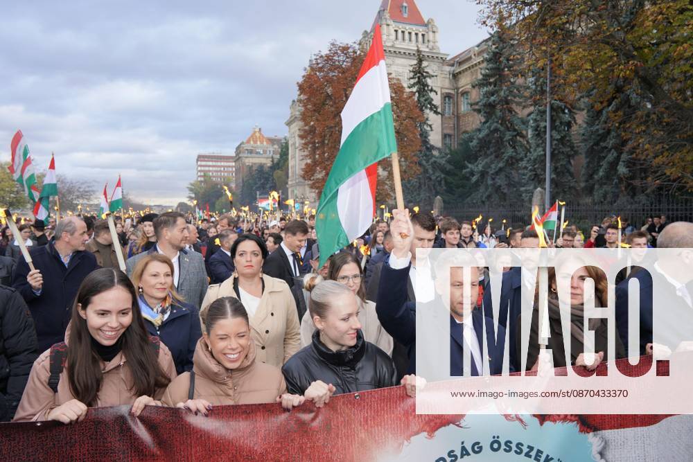 March of the Hungarian Prime Minister s party (Tisza Party) on the eve of the October 23 national holiday, commemorating the 70th anniversary of the 1956 Hungarian Revolution. October 23, 2026, marks the historic 70th anniversary of the 1956 Hungarian Revolution, a nationwide uprising against Soviet occupation and oppressive communist rule. This landmark anniversary is being observed through massive, solemn, and highly modernized nationwide commemorations across Hungary. Budapest Hungary - ZUMAp159 20261022_int_p159_519