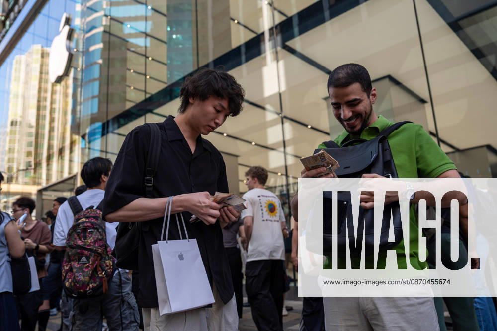 First Day on sale of IPhone Duo in Hong Kong An iPhone reseller trying to buy an iPhone duo from a woman outside an Apple Store on October 22, 2026 in Hong Kong. The iPhone DUO is Apple INC.s first foldable phone, today is the first day the new iPhone DUO is available to the public. (Photo by Vernon Yuen Nexpher Images) HONG KONG HONG KONG